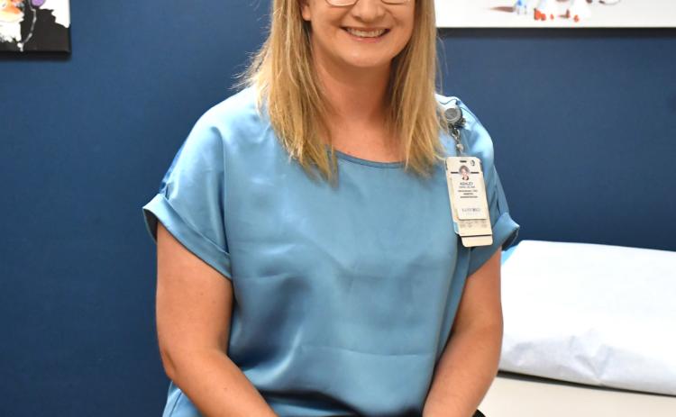 Ashley Ewing, newly appointed CEO of Webster’s Sanford Health location, sits in an exam room at the hospital July 9. Ewing served as director of nursing for 11 years before taking the role of CEO. Reporter &amp; Farmer | Leyton Beardslee