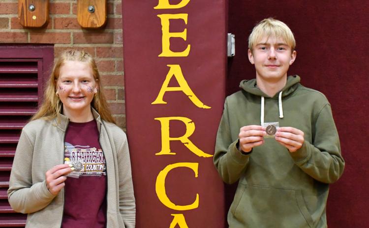 Webster Area varsity cross country runners, from left, Hannah Sonstebo and Grady Wagner qualified for the SDHSAA Class A meet held in Huron Oct. 25. Sonstebo finished 13th in the girls 5k at SDHSAA Region 1A meet Oct. 15 and Wagner placed 19th in the boys 5k. Reporter &amp; Farmer | Leyton Beardslee