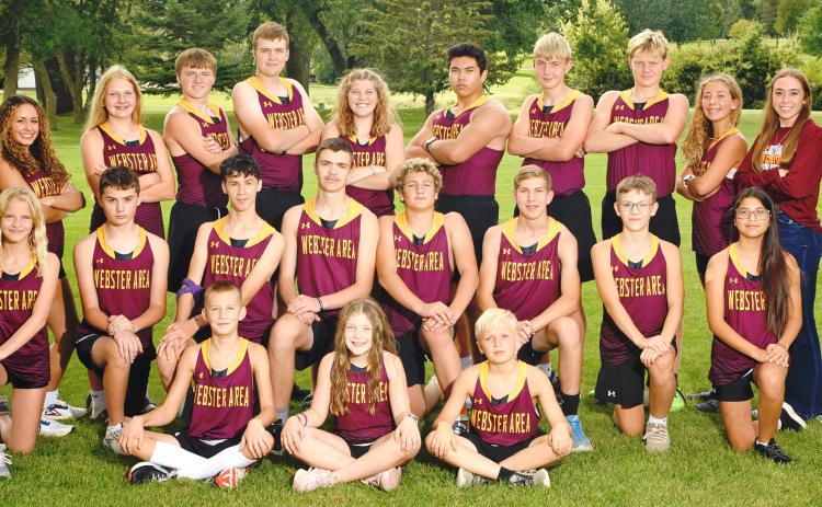 Webster Area 2024 cross country team, from left to right in front are Easton Ermer, Presley McClurg, Coen Halvorson; middle Kloey Garrett, Cooper Gregerson, Aidyn Cyrus, Jase Voss, Gavon Larson, Gabriel Gaikowski, Vance Tolifson, Dawn Heer; back Abbi Mays, Jocelyn Rumpca, Hannah Sonstebo, Jaxon Nimmer, Blaise McGregor, Abbi Garrett, Justin Ponce, Grady Wagner, Alec Garrett, Remi Hubsch, Student Manager Macee McGregor and Coach Cheryl McCreary.