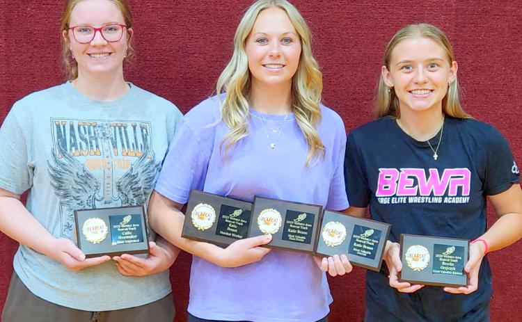 Webster Area girls track and field athletes hold up their end of season awards. From left Callie Shoemaker was awarded most improved, Katie Braun was awarded hardest worker, most valuable field events and the Ashley Charron award for most valuable overall, Brooke Grajczyk was awarded most valuable runner. Reporter &amp; Farmer | subscriber snapshot