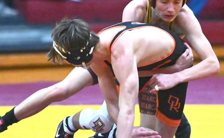 Tayten Kurkowski of Webster Area gets a grip on Camden Tebay of Dell Rapids Quarriers during their match at North/South Double Dual Feb. 5 in Webster. Kurkowski lost the match 1-4 by decision. Reporter &amp; Farmer | Brianna Jorgenson, Captured Creations Photography