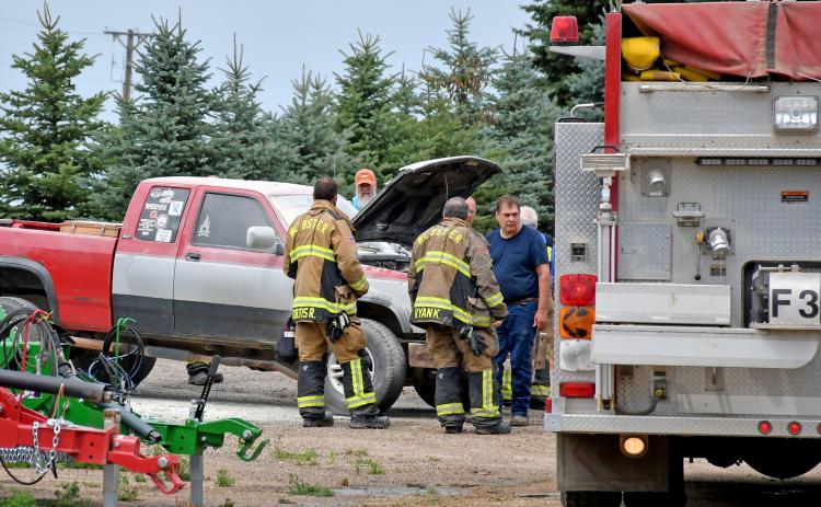 Webster firemen responded to report of a vehicle fire July 31 in Webster near the north entrance of the Northside Implement parking lot. By the time they arrived, however, employees from the nearby business had extinguished the flames in the engine compartment of the vehicle. Reporter &amp; Farmer | Amanda Dulitz