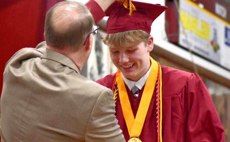 Blaize Larson had his tassel turned by Webster Area Superintendent Jim Block during Webster Area High School’s graduation ceremony at Webster Armory May 18. Larson was one of two senior class speakers at the event. Reporter &amp; Farmer | Leyton Beardslee