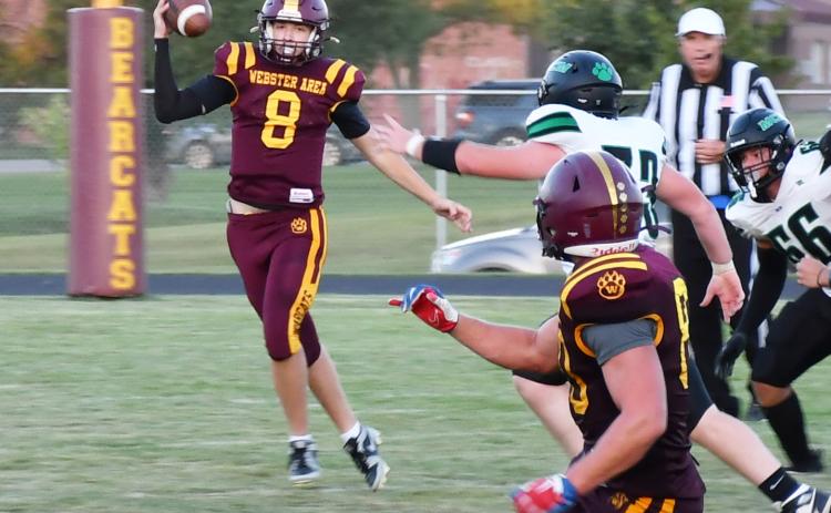 Webster Area quarterback Ian Lesnar attempts a pass on the run Aug. 30 against McCook Central/Montrose. Bearcats had little success on offense as the game finished with a score of 6-33, resulting in a Webster Area loss. Reporter &amp; Farmer | Brenner Cariveau