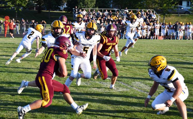 Webster Area running back Tate Mammenga braces for contact with a Groton Area Tiger during the homecoming contest Sept. 6, which resulted in a 7-14 loss for the Bearcats. Reporter &amp; Farmer | Brenner Cariveau