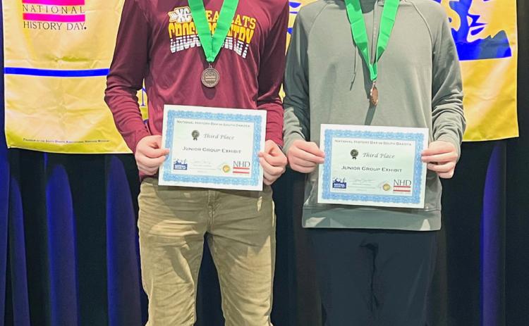 Jase Voss and Jackson Baumgarn show off the certificates they received, noting their attendance of the nationl event in June. Reporter &amp; Farmer | Subscriber snapshot