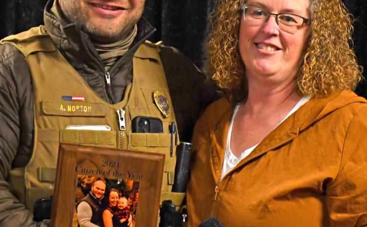 Austin Norton was awarded the Webster Area Chamber of Commerce Citizen of the Year at the Chamber’s annual meeting Jan. 20. Presenting the award was last year’s citizen of the year Amy Fischer. Reporter &amp; Farmer | Amanda Dulitz