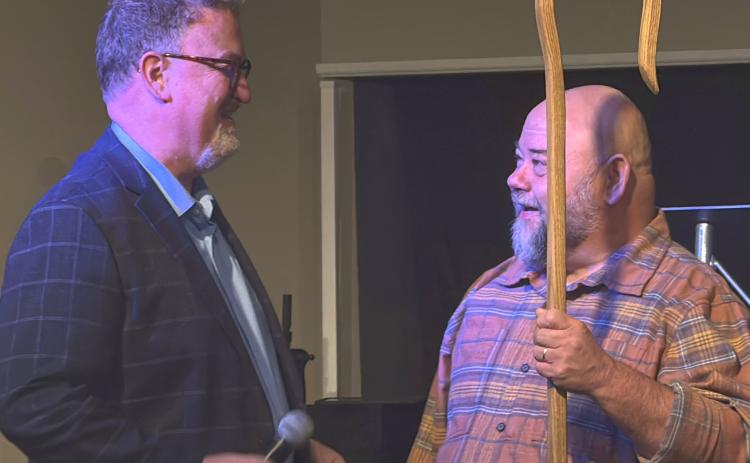 Drew Becker, left, Superintendent of the South Dakota Ministry Network of the Assemblies of God, presented Pastor Clark Audiss, right, with a ceremonial shepherd’s staff at Freedom Church service Sept. 27 in Webster. The ceremony marked Audiss’s progression from campus pastor to lead pastor and the church’s transition to a standalone general council church. Reporter &amp; Farmer | Subscriber Snapshot