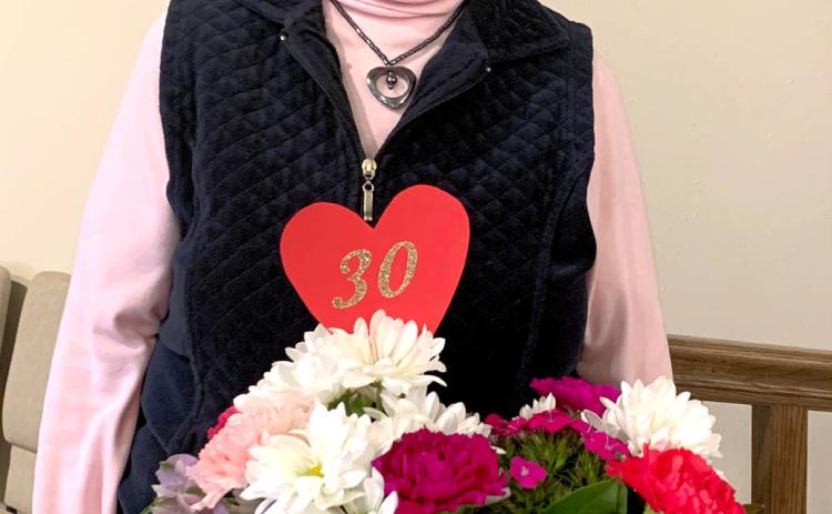 Lorinda Towe poses with the special bouquet of flowers she had made to celebrate surviving 30 years with a heart transplant. The Bristol woman received her new heart the day after Easter in 1994, enabling her to live a normal, active life in the community. Reporter &amp; Farmer | Amanda Dulitz