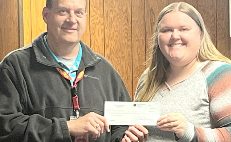 Kayla Kirchmeier, Webster Kiwanis vice president, presented a check for over $9,400 to Webster Area School Superintendent Jim Block Funds were raised by selling concessions at home sporting events. Reporter &amp; Farmer | Subscriber snapshot