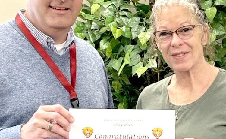 Webster Area School Superintendent Jim Block presented the support staff member of the year certificate to high school custodian Lorea Roskos. Roskos has been in the district for two years. Reporter &amp; Farmer | Subscriber snapshot