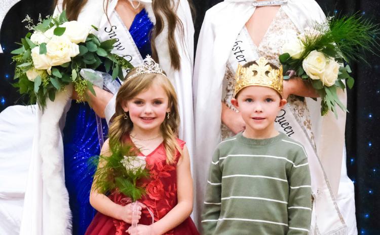 Representing Webster at the upcoming South Dakota Snow Queen Festival in Aberdeen will be, from left, Josie Spiering, 2026 Webster Snow Queen and Remi Hubsch, 2026 Webster Junior Snow Queen. The two were crowned during Webster Snow Queen coronations in the Webster Area High School gymnasium Nov. 22. Also pictured in front, from left, are Webster Snow Princess Blakely Hanson and Webster Snow Prince Grayson Kuecker. Reporter &amp; Farmer | Leyton Beardslee