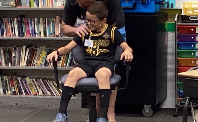 Tucker Aadland, student at Webster Area School and STARBASE instructor “Viper,” Jesse Rounds demonstrating Newton’s second Law of Motion during the STARBASE class time experiment. Reporter &amp; Farmer | Subscriber Snapshot