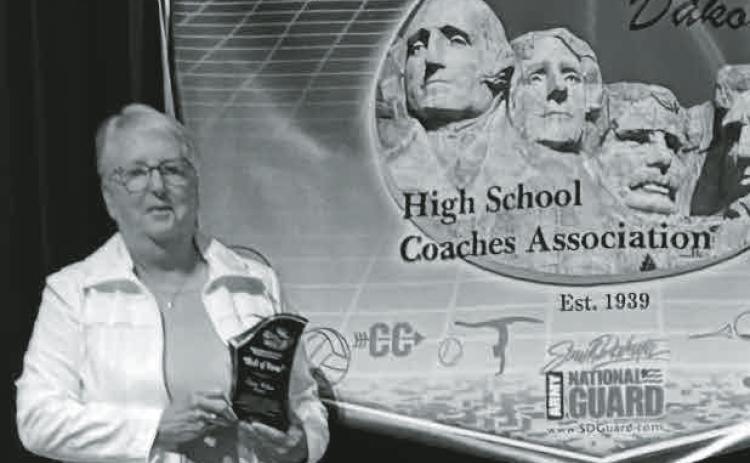 Retired Webster High School Volleyball coach Cindy Nelson poses with her award July 20 in Mitchell after being inducted into the South Dakota High School Coaches Association’s Hall of Fame. Nelson coached Webster Volleyball for 27 years from 1982 until 2008. Reporter & Farmer | subscriber snapshot