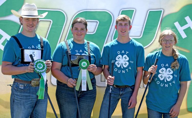 Senior 4-H showmanship winners for beef are, from left, grand champion Caleb Gaikowski, reserve grand champion Adaline Larson, Gabriel Gaikowski and Brooke Meland. Reporter &amp; Farmer | Amanda Dulitz