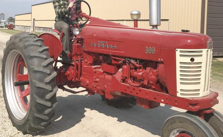 Davis Lorimor, Keystone won the Farmall tractor at the 13th Carl M. Johnson memorial tractor giveaway during the James Valley Threshing Show in Andover. Reporter &amp; Farmer | Subscriber snapshot