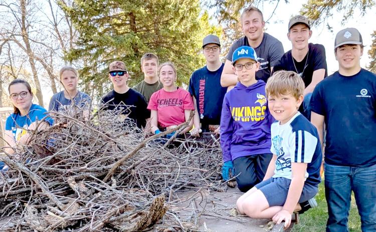 Country Kids 4-H club helped with their annual clean up of New Sweden Cemetery and planted flowers there. Pictured from left, kneeling front, Nolan Rasmus, Will Weitbrecht; in back, Lynnea Hubsch, Morgan Weitbrecht, Dylan Rasmus, Aiden Gaikowski, Macee McGregor, Blaise McGregor, Isaac Nelson, Gabriel Gaikowski and Nathan Hubsch. Reporter &amp; Farmer | Subscriber snapshot