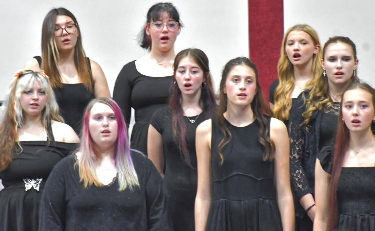 Webster Area School District held their seventh to 12th grade fall concert Oct. 5. Here, students performed “Good Day Sunshine” by the Beatles. From left are, back, Kodee Marx, Keelee Severson, Abbi Mays; middle, Kaia Cyrus, Joanna Lone, Haylee Hesla; front, Adianna Angiolelli, Avery Kvernevig and Teagan Howder. Reporter &amp; Farmer | Connor Handrahan