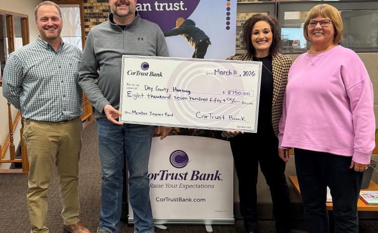 Day County Housing was awarded an $8,750 grant from CorTrust Bank, in partnership with Federal Home Loan Bank of Des Moines (FHLB Des Moines) as part of their matching grant program called the Member Impact Fund. Pictured March 31 at CorTrust Bank in Webster are, from left, Day County Housing board members Morgan Dorsett, Derek Sinner; Webster CorTrust Bank manager Lana Holland and Day County Housing board member Peggy Ninke. Reporter &amp; Farmer | Subscriber snapshot