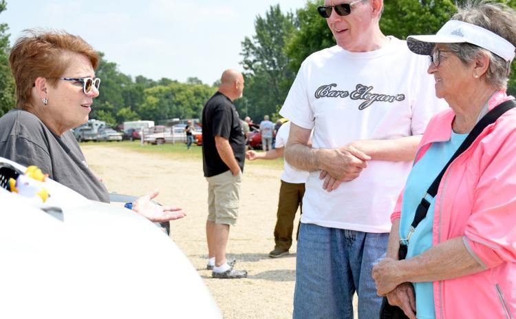 (Above) Christy Brubaker of Aberdeen speaks with Ron Hinze of Arizona and his mother Della Hinze of Webster during the Day County Fair Car Show Aug. 10. Showing her 2020 Jeep Wrangler, Brubaker told passersby the story of the Ducking Kindness movement, which is believed to have started during World War II and is associated with Jeep vehicles. Reporter &amp; Farmer | Amanda Dulitz