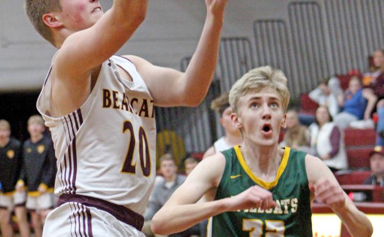 Webster Area Bearcat Michael Dorsett goes up for a basket Feb. 11 at home against Northwestern Wildcat Dallas Stoltenberg. The Wildcats came out the bigger cats on the game, going 66-55. On the night, Dorsett put up two points. Reporter &amp; Farmer | Subscriber snapshot