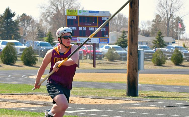 McKoy Pereboom begins a pole vault attempt April 21 at Webster. Reporter &amp; Farmer | Leyton Beardslee