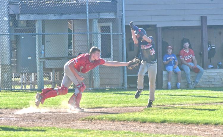 A round robin tournament was held in Webster July 11 and Teeners played three games over the course of a single day. Here, catcher Bensen Huggett can be seen tagging a runner who tried to make it home after a ground ball was hit. Reporter &amp; Farmer | Connor Handrahan