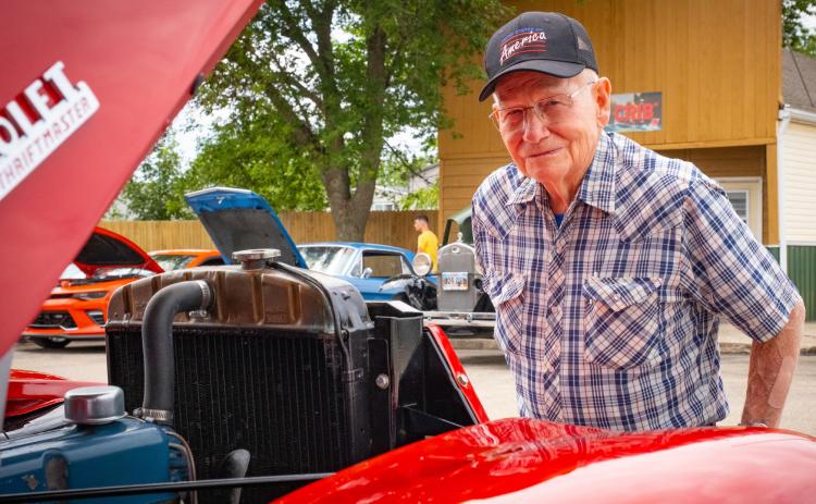 Stan Arnold of Waubay looks over a 1947 Chevrolet Thriftmaster pickup during a car show at Waubay Fun Fest July 19. The car is owned by Dean Enstad of Watertown who pieced the car together including using the cab from his dad’s farm truck and seats from a 2007 Chevorlet Silverado. See more photos from Fun Fest on 5. Reporter & Farmer | Leyton Beardslee