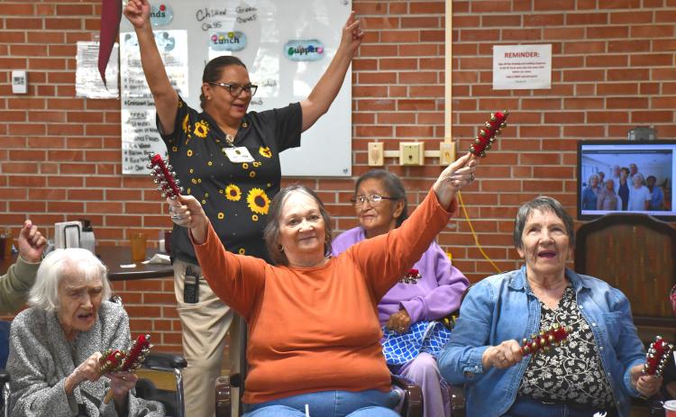 Bethesda Home was moving and grooving Oct. 21 for a musical activity where residents use noisemakers to turn simple rhythms and melodies into a low-impact workout. Front row, from left: Zona Hairgrove, Pam Schumack and Marilyn Stern. Back row: staff member Amanda Sullivan and resident Georgette Sullivan. Reporter &amp; Farmer | Timothy Gibson