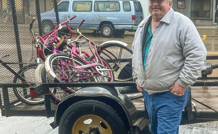 Jim Mortenson stands in front of his trailer filled with bikes waiting to be transported to his shop in Conde where he will refurbish them to new. This activity has become a hobby-turned-lifestyle and has been going strong for 31 years. Reporter &amp; Farmer | Annie Witt