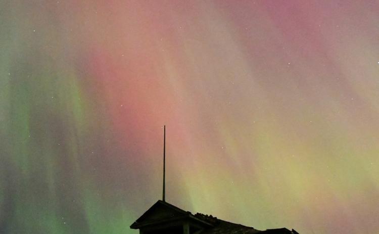 One of the biggest solar storms to hit earth in nearly two decades arrived last weekend, May 10-11 when the aurora borealis, commonly known as the northern lights, could be seen overhead Friday night into early Saturday morning. Here, the old Morton Township school house south of Webster stands in the foreground as colorful lights fill the sky behind. Reporter &amp; Farmer | Amanda Dulitz