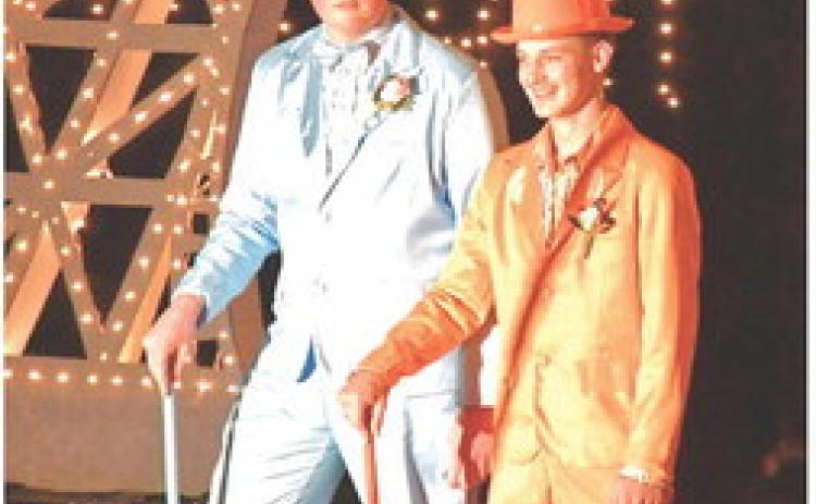 Waubay School held their prom April 10 and students were very excited to show off their hard work put into the celebration. From left, Derek Karst and Linken Niles participate in the Grand March by showing off their dapper and luxurious suits. See more on 14. Reporter &amp; Farmer | Connor Handrahan