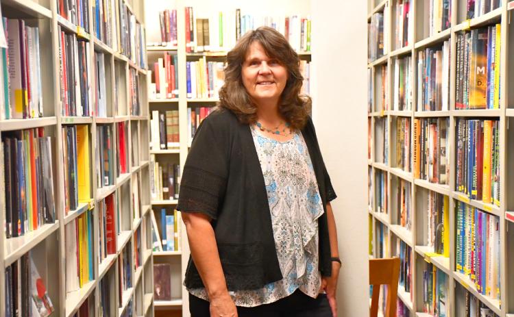 New head librarian Patricia Proctor stands in the Webster Public Library June 11. Proctor started June 4 and is taking over the position from Teri Ewalt who retires at the end of the month. Reporter &amp; Farmer | Leyton Beardslee