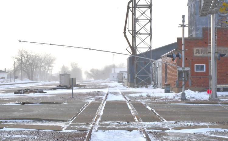 High winds bent over one of railroad crossing barricade along train tracks in Webster Dec. 18. Reporter &amp; Farmer | Leyton Beardslee