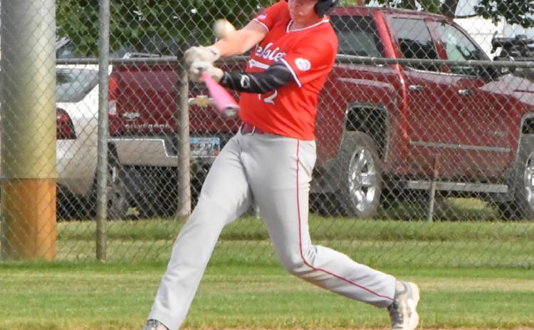 Webster Post 40 Bensen Huggett gets a hit during the fourth inning and secures a single during Post 40’s game against Sisseton June 25. Reporter &amp; Farmer | Connor Handrahan