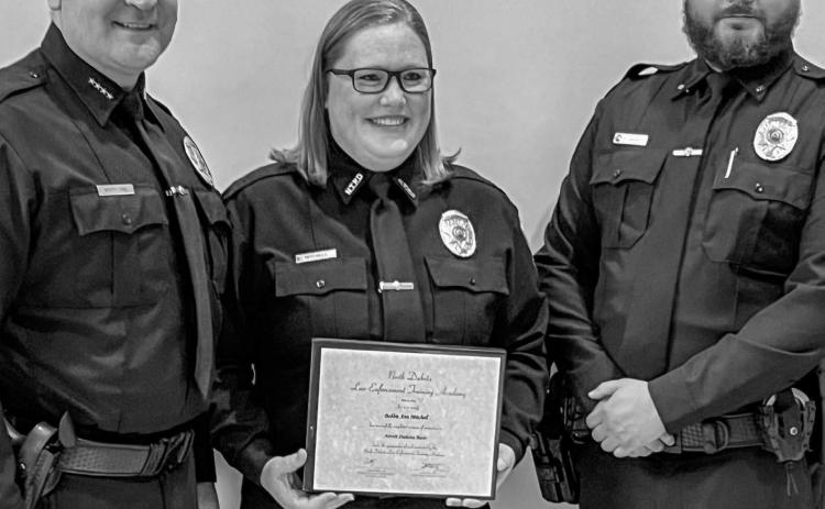 Bobbi Ann Mitchell, pictured center, celebrated the completion of law enforcement school May 2 from Bismarck, ND. She is pictured with Chief Troy White Owl and Sargent Demetrius Jamerson. Mitchell is set to begin working for the city of New Town, ND after completing the 12-week course to become a certified law enforcement officer. She is the daughter of Patti Mitchell of Grenville Reporter &amp; Farmer | Subscriber snapshot