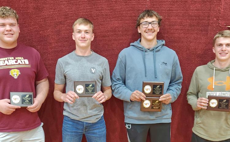 Webster Area boys track and field athletes hold up their end of season awards. From left Gage Miotke was awarded most improved, Henry Witt was awarded most valuable runner, Jeron McCreary was awarded most valuable for field events and Mike Bartos award for most valuable overall, Martin Dorsett was awarded hardest worker. Reporter &amp; Farmer | subscriber snapshot