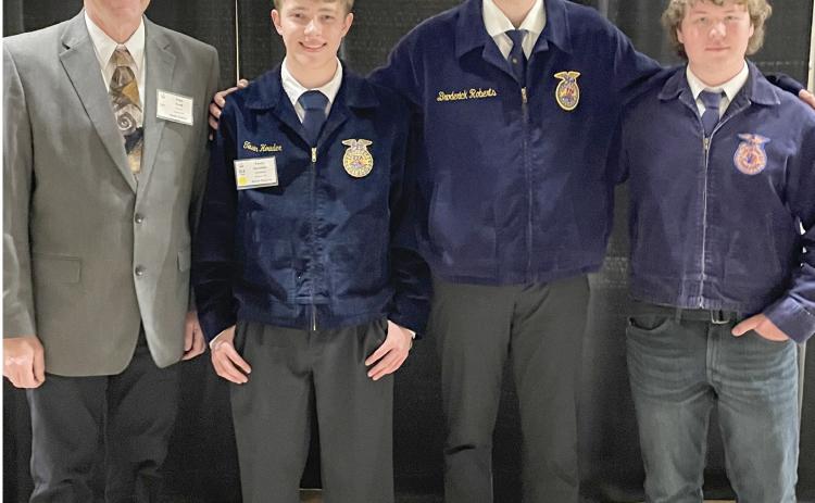 From left, coach Fred Zenk is pictured with Webster FFA team of Tevin Howder, Dylan Carlson and Brayden Aadland who competed at the National Range Judging Event May 2 near El Reno, OK. The South Dakota team placed 13th at the event. While in Oklahoma City the teams toured the National Bombing Site Museum and the National Cowboy and Western Heritage Museum. Reporter &amp; Farmer | Subscriber snapshot