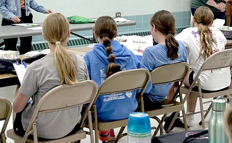 Day County Extension and SD Department of Health-Public Health Office hosted a babysitting class June 4. Seated, participants received CPR certification, learned about child care, safety, emergency preparedness and basic first aid. Standing are instructors Public Health Nurse Briana Aadland, left and 4-H Educator Jennifer Ringkob. Reporter &amp; Farmer | Subscriber snapshot