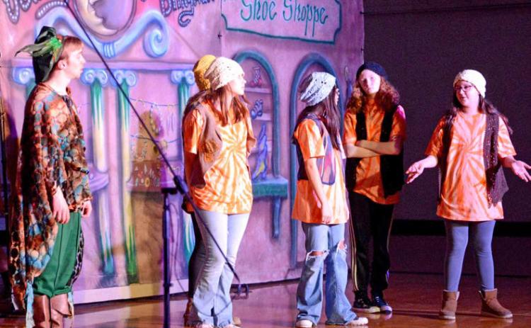 Webster Area Schools played host to the Dakota Players March 14. They put on a musical production – which student-actors had only a week to practice – depicting a spin on the classic “Emperor’s New Clothes” story. Pictured from left are Dakota Player director Grant Meyers, Webster Area students Ashley Rumpca (behind), Hannah Crawford, Dawn Heer, Kalli Holman and Lyric Cyrus. Reporter &amp; Farmer | Amanda Dulitz
