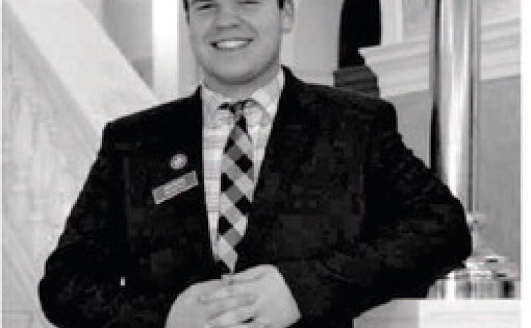 Gage Miotke poses on the stairwell inside the state capitol building in Pierre during his tenure as a senate legislative page during the 2025 session.
