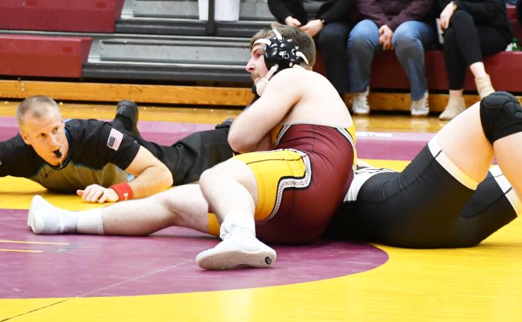 Bearcats wrestling hosted the Webster Area Triangular Jan. 30 at the amory. Here, Matthew Angiolelli holds his opponent in a headlock. Reporter &amp; Farmer | Brenner Cariveau