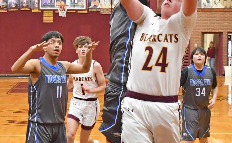 Webster Area Bearcat McKoy Pereboom goes up for a basket inside the paint Jan. 7 against Tiospa Zina. Pereboom contributed six points to the Bearcat’s score of 78 for the night versus the Wambdi’s 38. Reporter &amp; Farmer | Brenner Cariveau