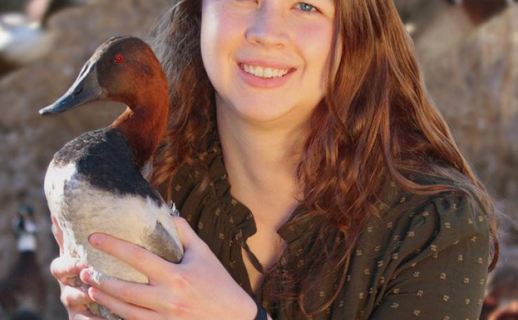 Madison Grimm founder of Second Chance Flight holds up a Redhead duck. Grimm’s nonprofit is one of two duck egg salvage programs in the U.S. working to rescue and rehabilitate ducklings and eggs which have had their nests destroyed by agricultural activity. Reporter &amp; Farmer | Subscriber snapshot
