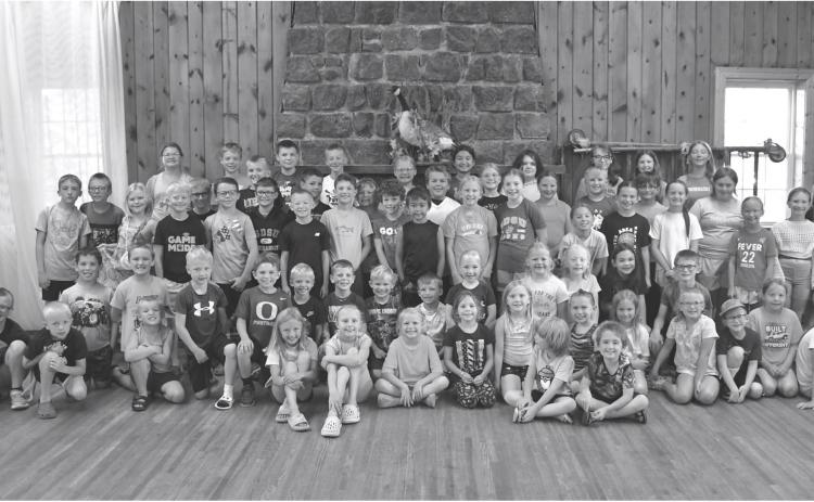 Webster Public Library’s summer reading program party attendees pose for a picture at Izaak Walton in Webster June 30. Sitting in front row from left are Harlyn Deutsch, Amelia Keintz, Aubree Kwasniewski, Huntley Aadland, Berkley Matthews, Jadyn Campbell, Laynie Bjerke, Isaiah Campbell, Arabella Ewing, Beatrix Howe, Leo Siemonsma, Harlow Heupel, Leah Waldner and Ally Moos. Kneeling from left are Rhett Kuecker, Kohenn Konradi, Tyler Acree, Morgan Snaza, River Marko, Audie Kuecker, Harrison Fosheim, Nixon Deu