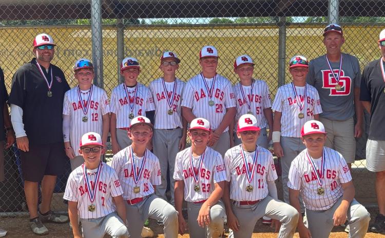 Roslyn Diamond Dawgs baseball team pose for a picture after winning the 11U NIT End of Season tournament at Tharaldson Little League Complex in Fargo, ND July 27. Back, from left, are Tyler Lee, Jerry Lesnar, Decker Huggett, Cooper Gangle, Easton Ermer, Kane Baumgarn, Kru Johnson, Braxton Breske, Mark Ermer and Spencer Huggett. Front, from left, are Tucker Aadland, Jaxson Hansen, Landen Lee, Cooper Lesnar and Landry Lesnar. Reporter &amp; Farmer | subscriber snapshot