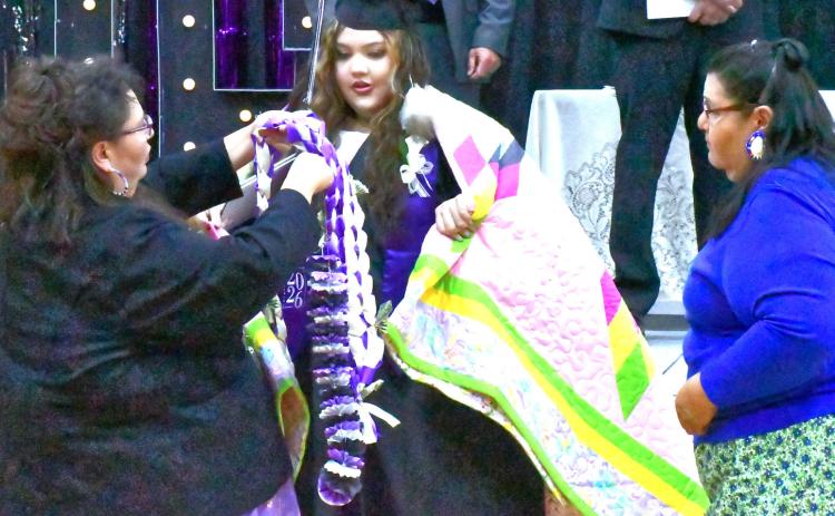 Waubay School held their graduation May 9 and honored the nine seniors who have finished high school. From left, Jo Roberts and Roxanne Roberts celebrate Jorie Robert’s graduation and honor her with gifts. Reporter &amp; Farmer | Connor Handrahan