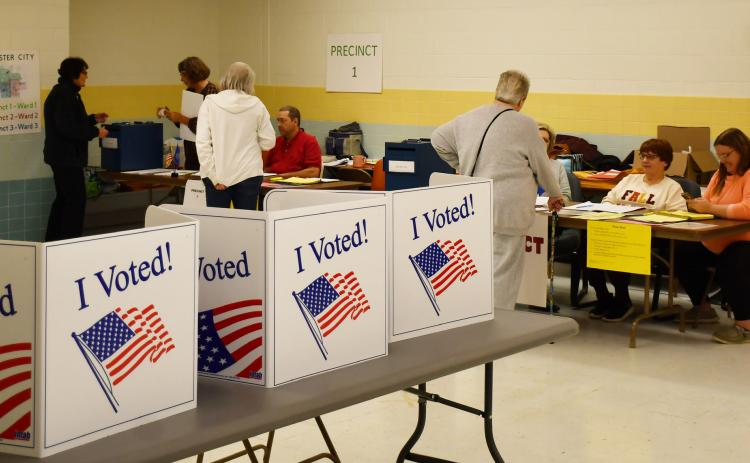 Day County citizens talk to local election workers and turn in their ballots Nov. 5 during the 2024 General Election at the Day County Courthouse. Reporter &amp; Farmer | Brenner Cariveau