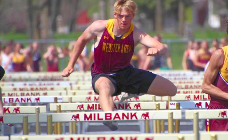 Tenth grader Gage Baumgarn jumps a hurdle during the Valley Queen Cheese Invite at Milbank May 6. Reporter &amp; Farmer | Subscriber Snapshot