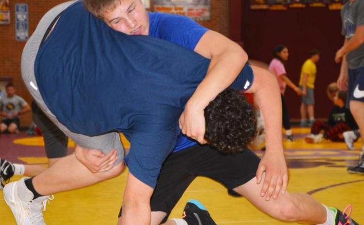 Bearcat grappler Chase Gregerson works a move on Jones County wrestler Bayden Raymond at the Thorn wrestling camp which took place June 9-11 at the Webster Armory. Reporter &amp; Farmer | Annie Witt
